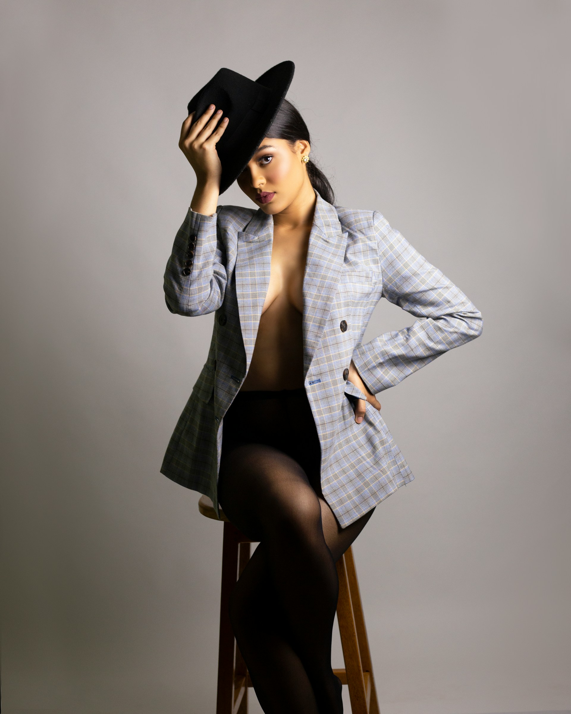 a women wearing polo with a hat